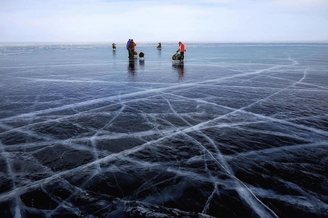 Best Places to Visit in Russia for an Unforgettable Trip 2 Frozen Lake Baikal, a stunning natural wonder in Russia Best Places to Visit in Russia