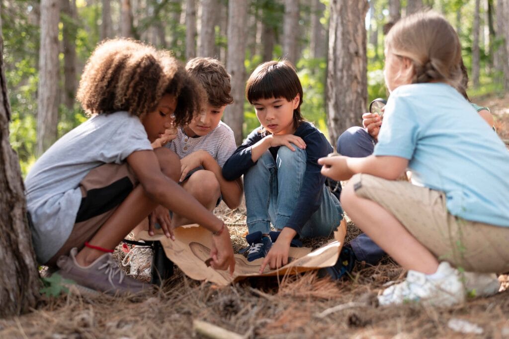 Best Summer Camps Abroad for Indian Kids – June & July 2025 Options 3 children participating treasure hunt 11zon